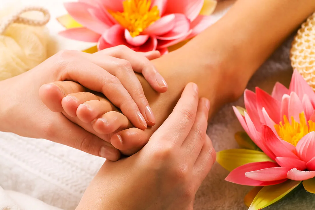 Foot reflexology massage on pressure points